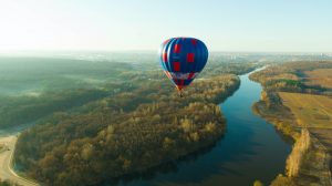balloon-in-the-sky-over-the-river-and-forest-fog-on-the-background.jpg